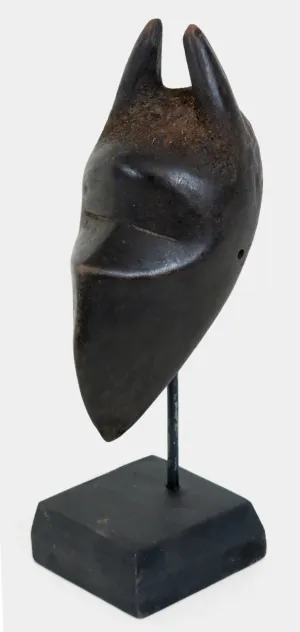 Dan Passport Mask on a Stand