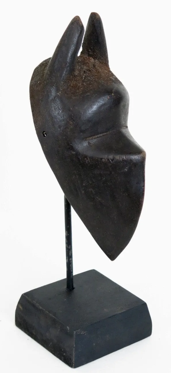 Dan Passport Mask on a Stand